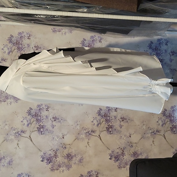 Long sleeved white collar, button down ruffled blouse w/black attached tie. - Picture 2 of 5